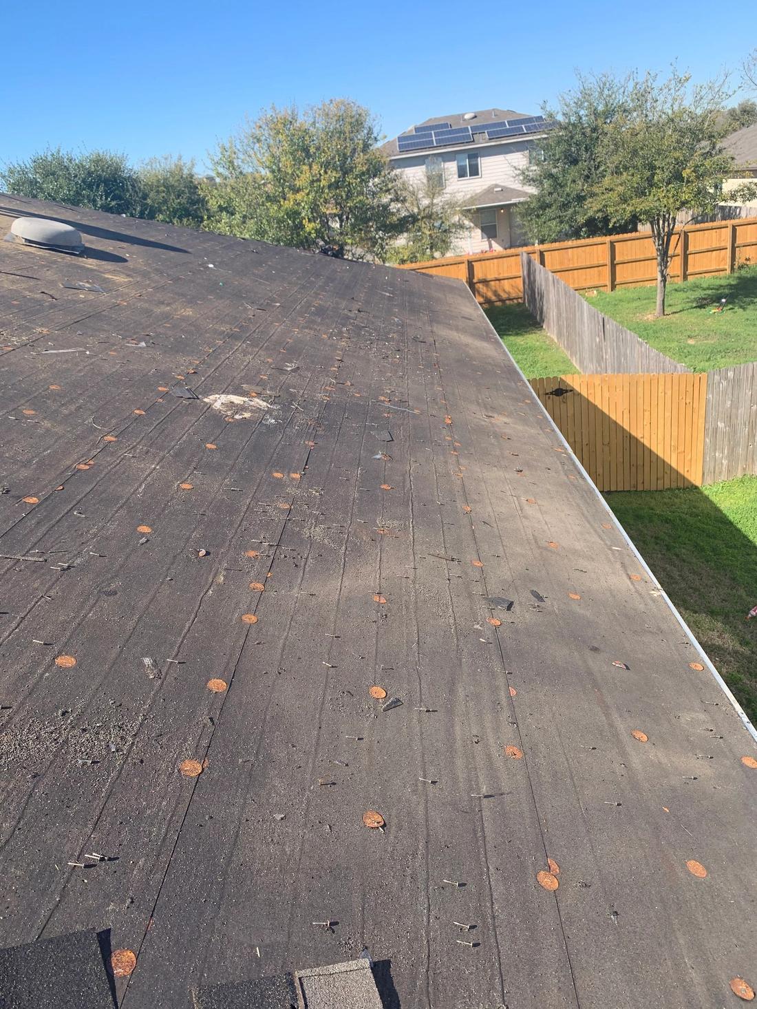 Roof after tear-off with underlayment and drip edge